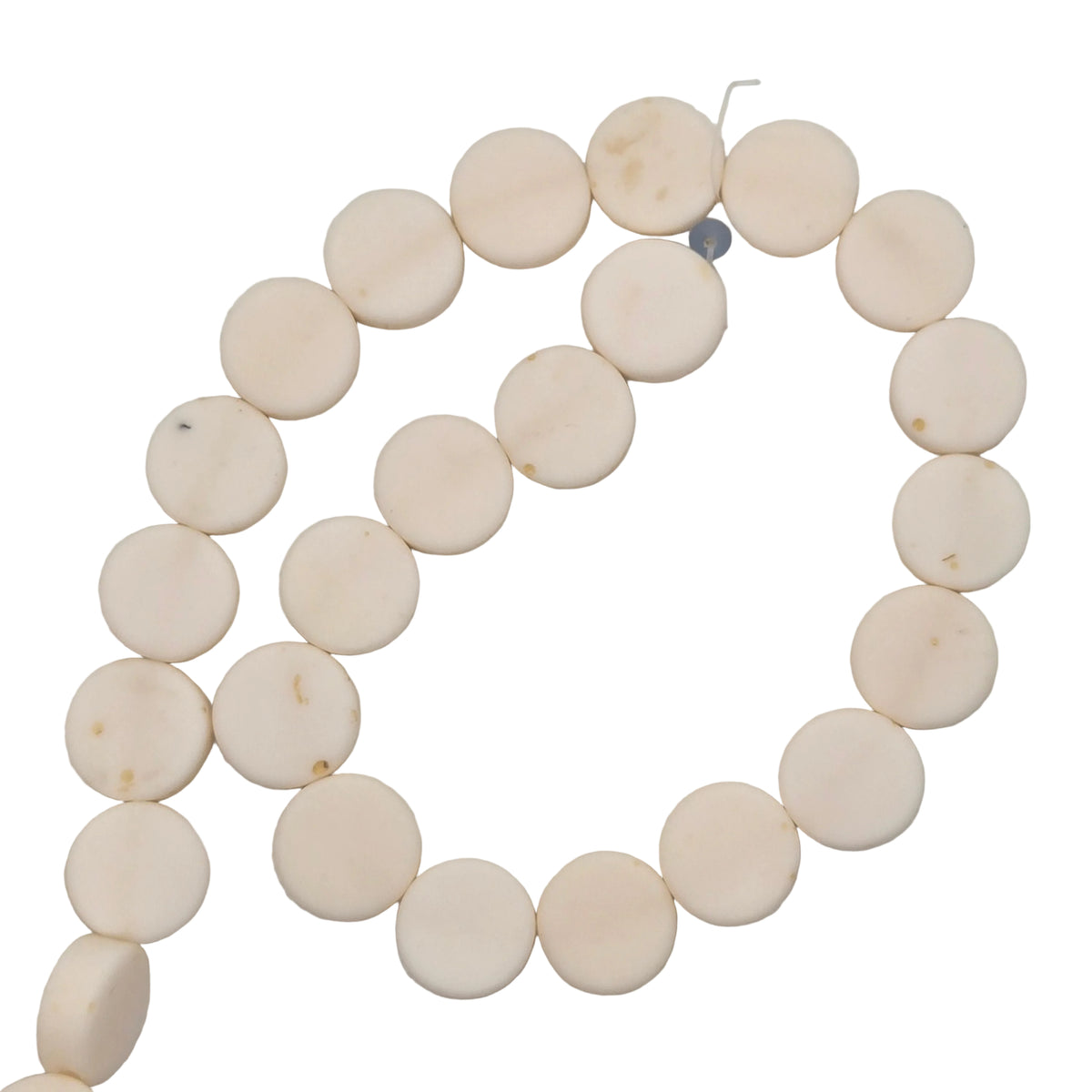 White rondelle resin bead strand of flat round discs, evenly spaced.