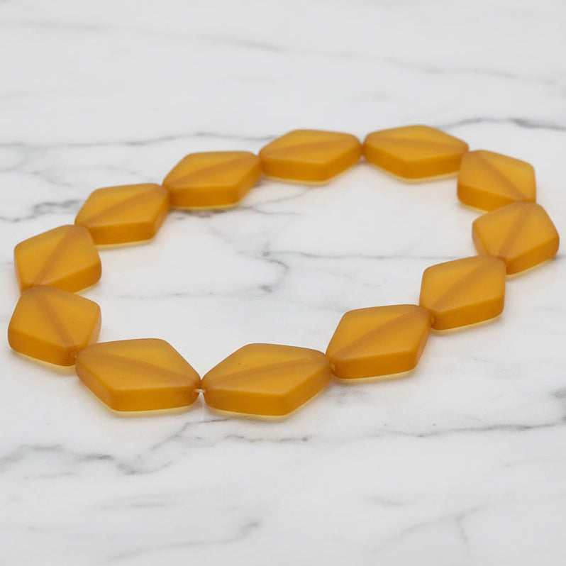 Yellow diamond-shaped resin bead strand, faceted hexagon-style beads on loop