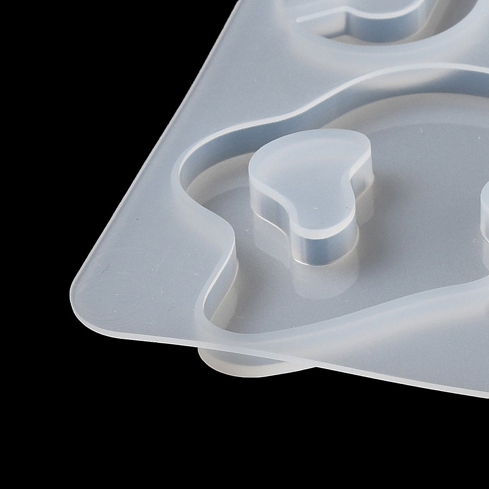 Silicone mold cavity detail for casting small pendant pieces