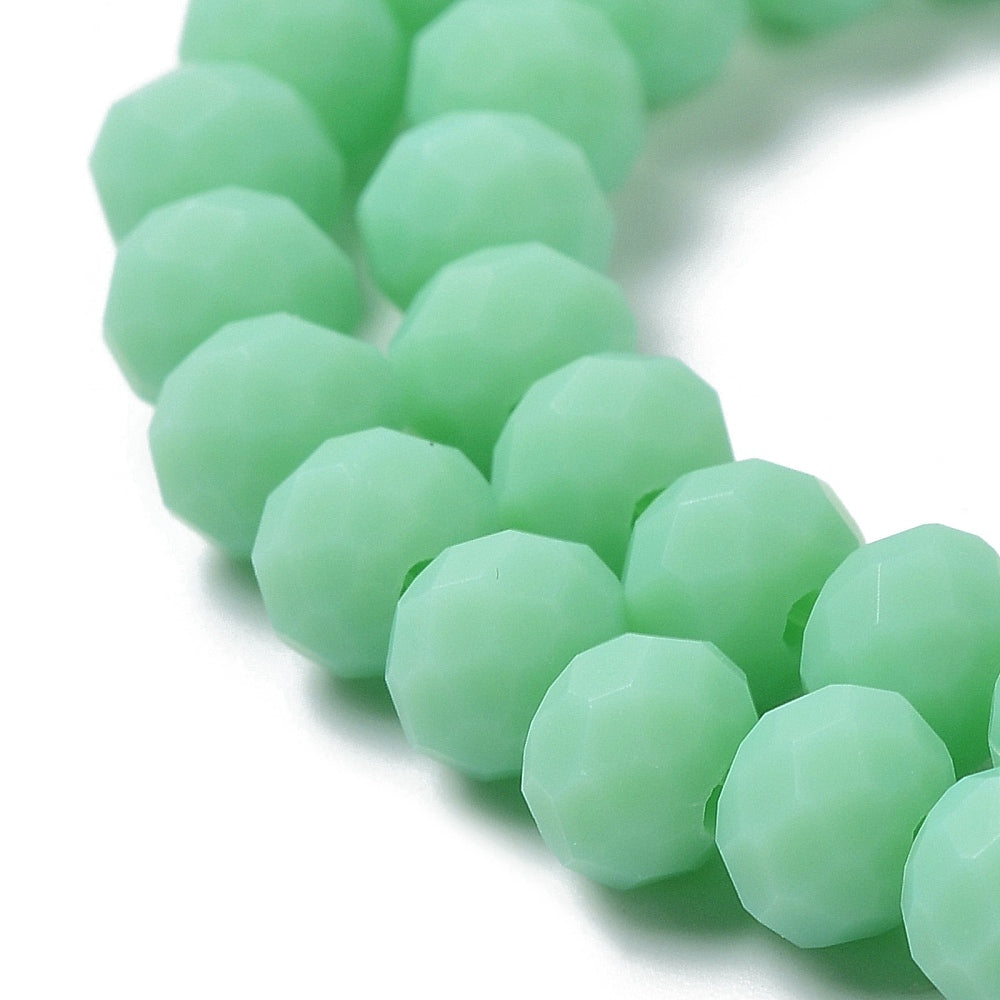 Spring green faceted frosted glass rondelle beads, detailed bead faces