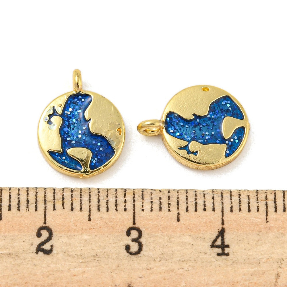 Gold plated round blue enamel earth charm with top loop, shown beside ruler