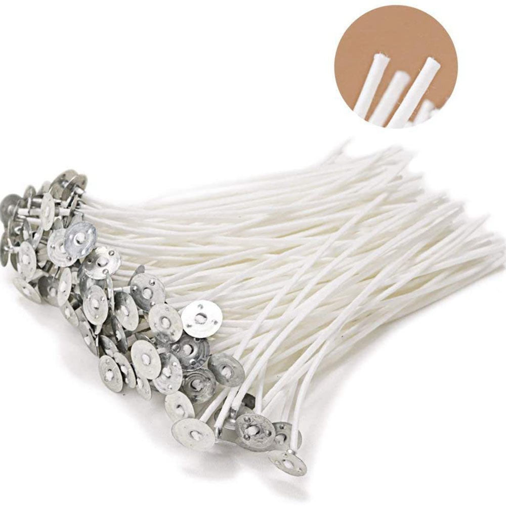 White cotton candle wicks with metal sustainer tabs, fanned set