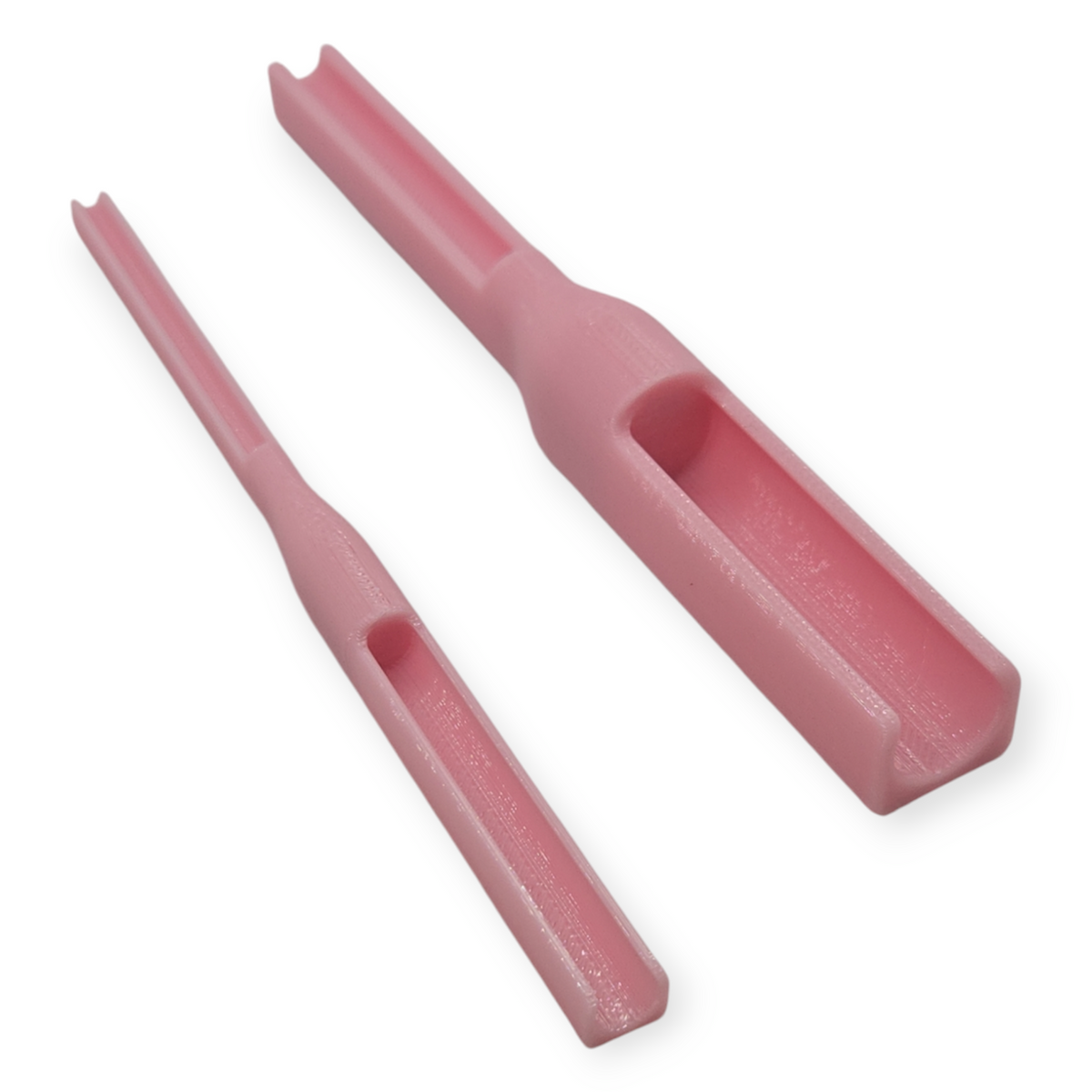 Knotting tool set, two pink plastic tools with notched ends for knotting