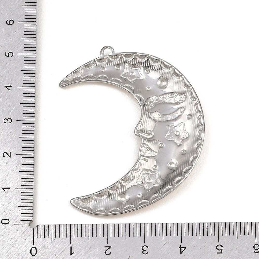 Silver crescent moon pendant with textured surface and hanging loop, size shown