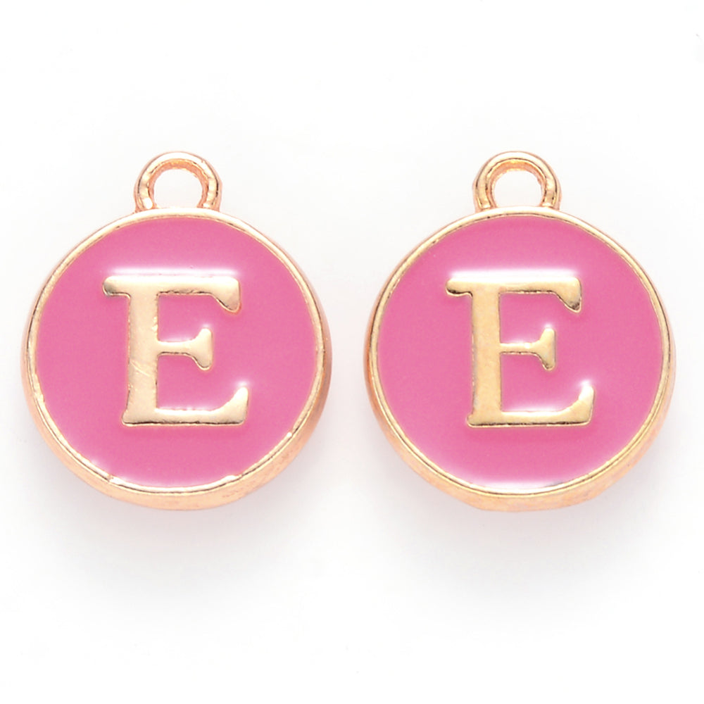 Round enamel letter charm E: pink with gold-tone bezel and loop