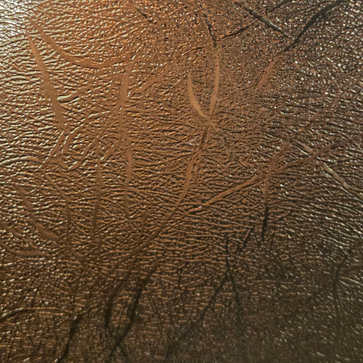Gold textured metallic permanent vinyl sheet with embossed pattern