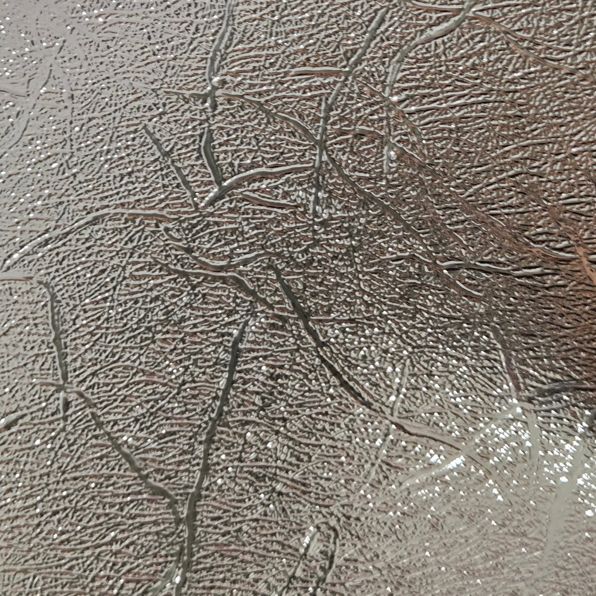 Bronze textured metallic permanent vinyl sheet with raised crackle pattern