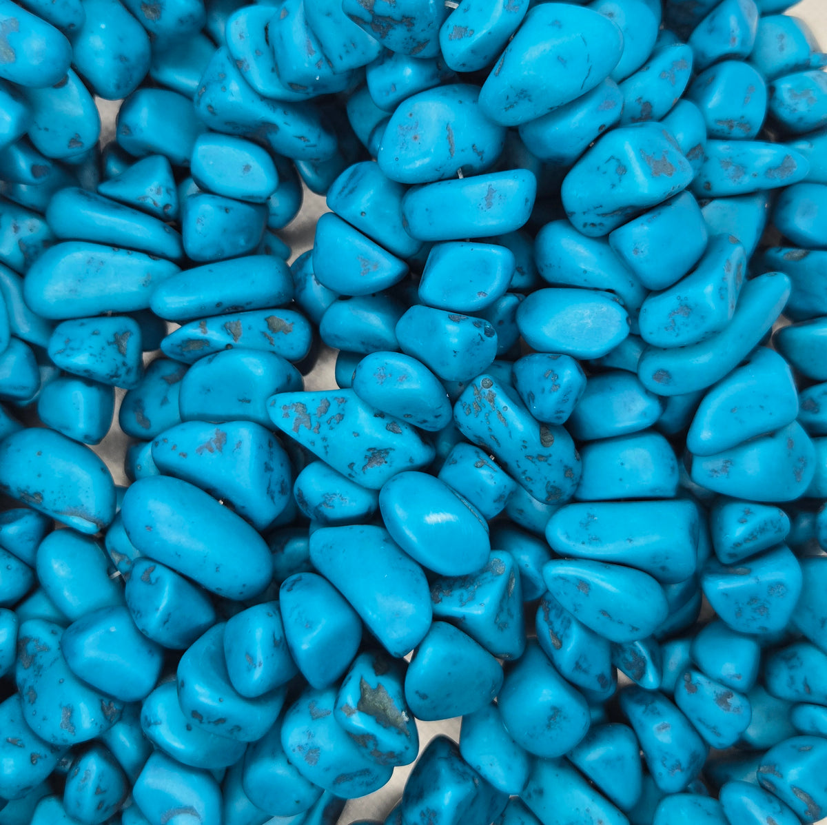 Turquoise resin chip beads strand with irregular tumbled pieces, bright blue finish