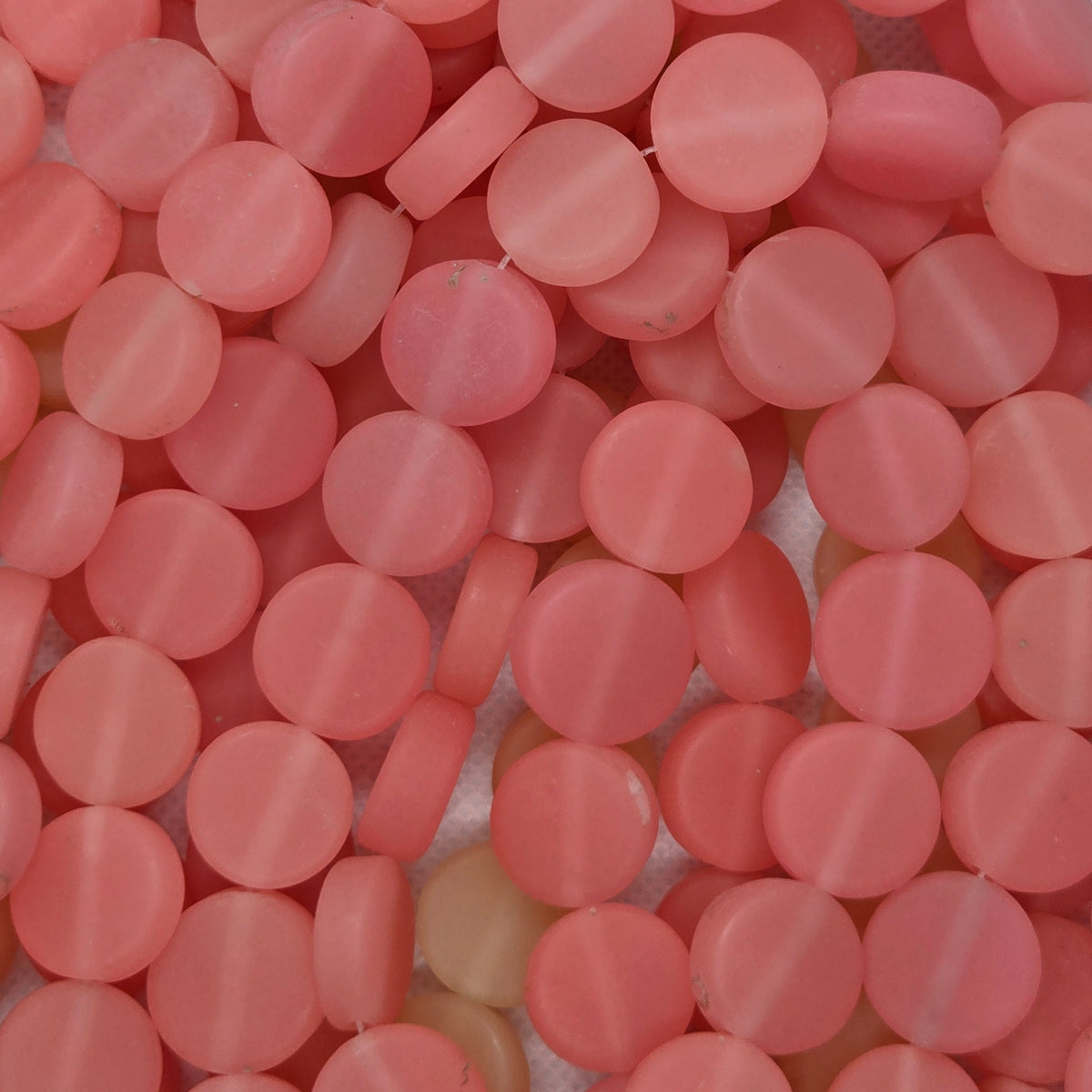 Pink flat rondelle resin beads, matte translucent look
