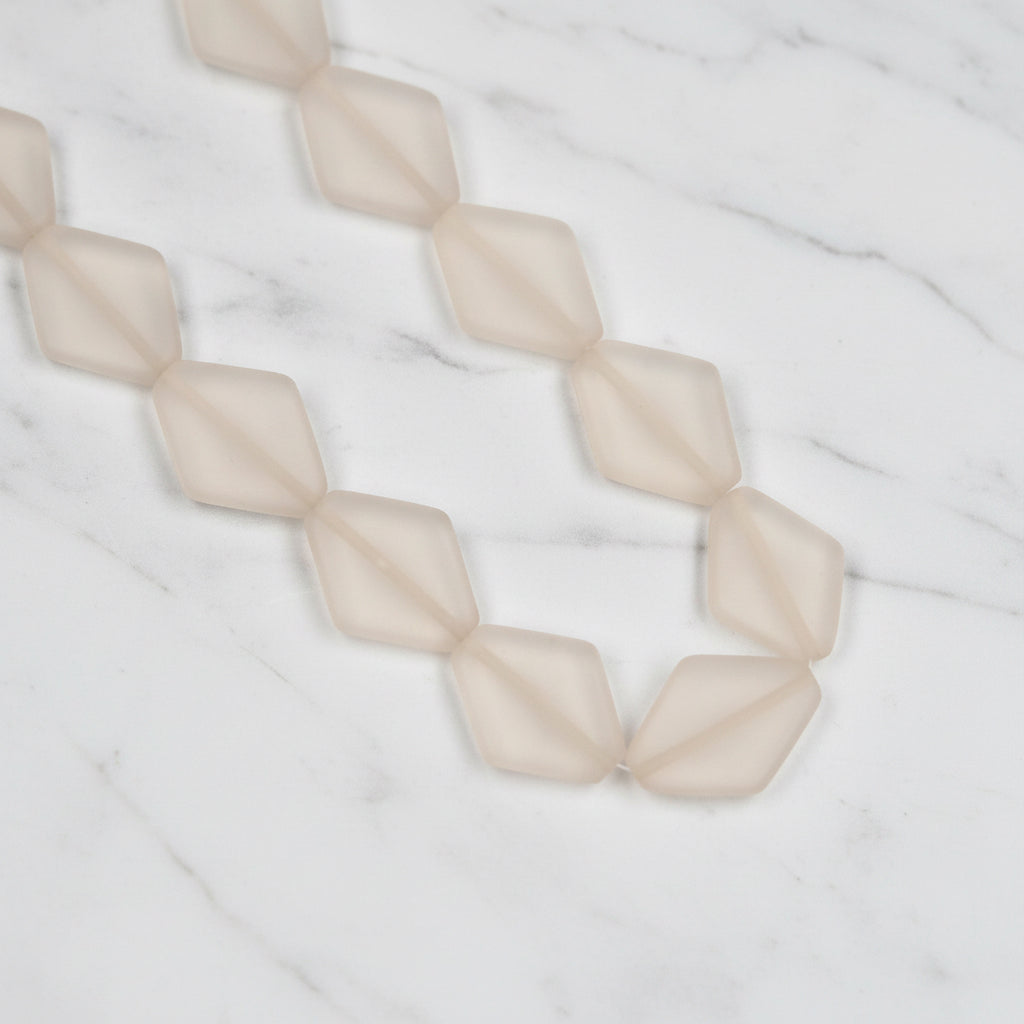 Diamond-shaped resin beads strand, clear translucent faceted beads