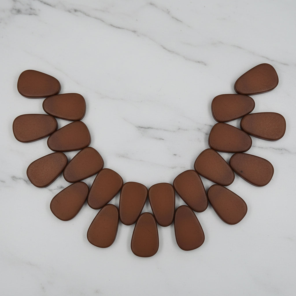 Brown teardrop resin beads arranged in a circular wreath shape
