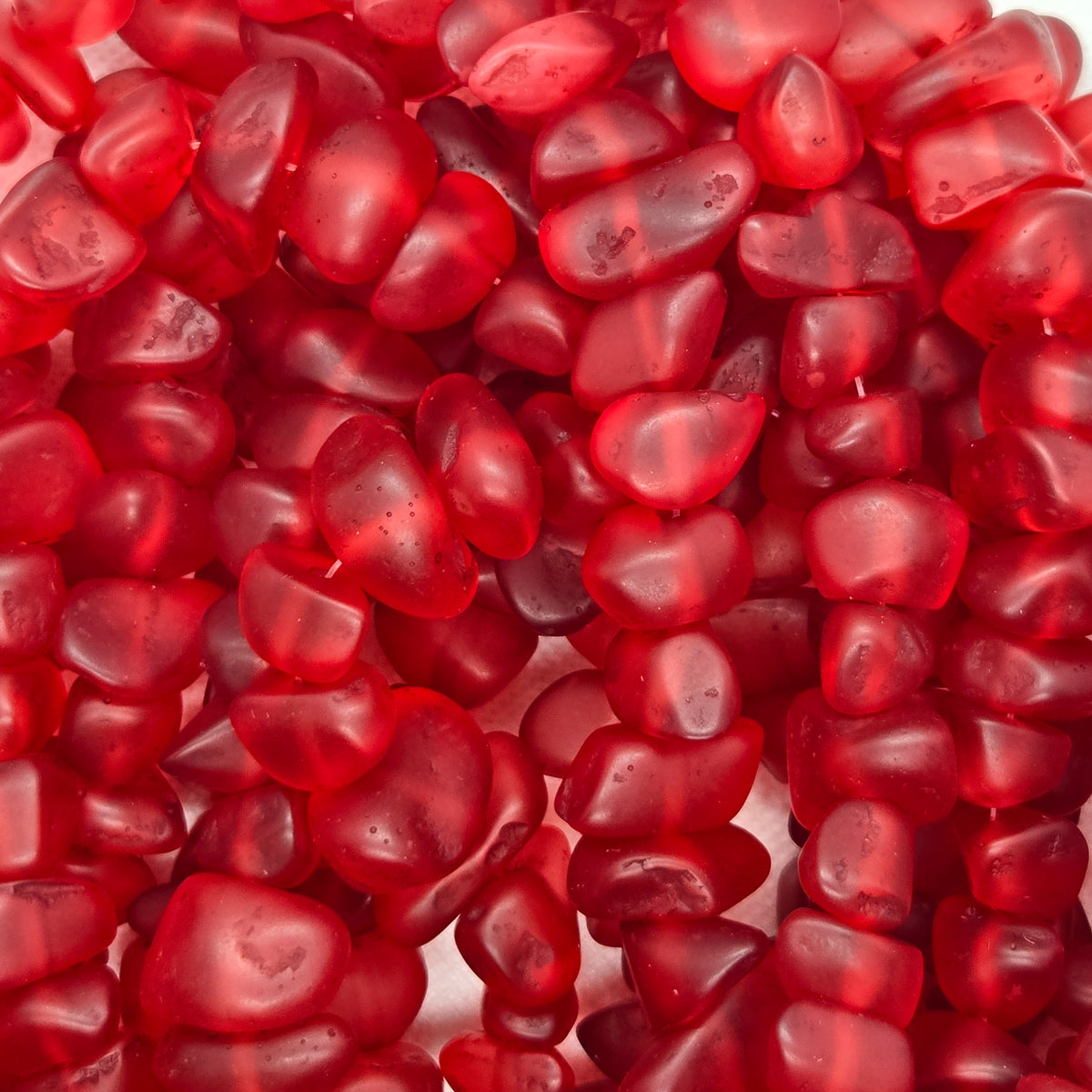 Red resin chip beads, glossy heart-shaped pieces with speckled texture