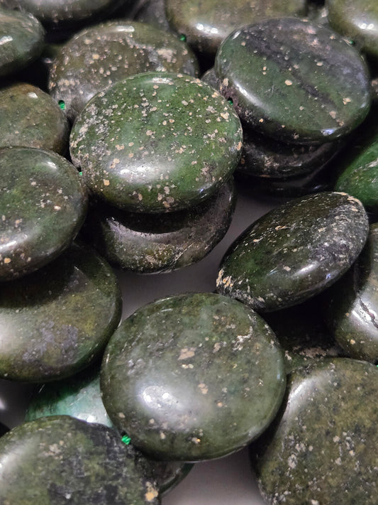 Dark green serpentine gemstone beads, oval tumbled stones with light speckles