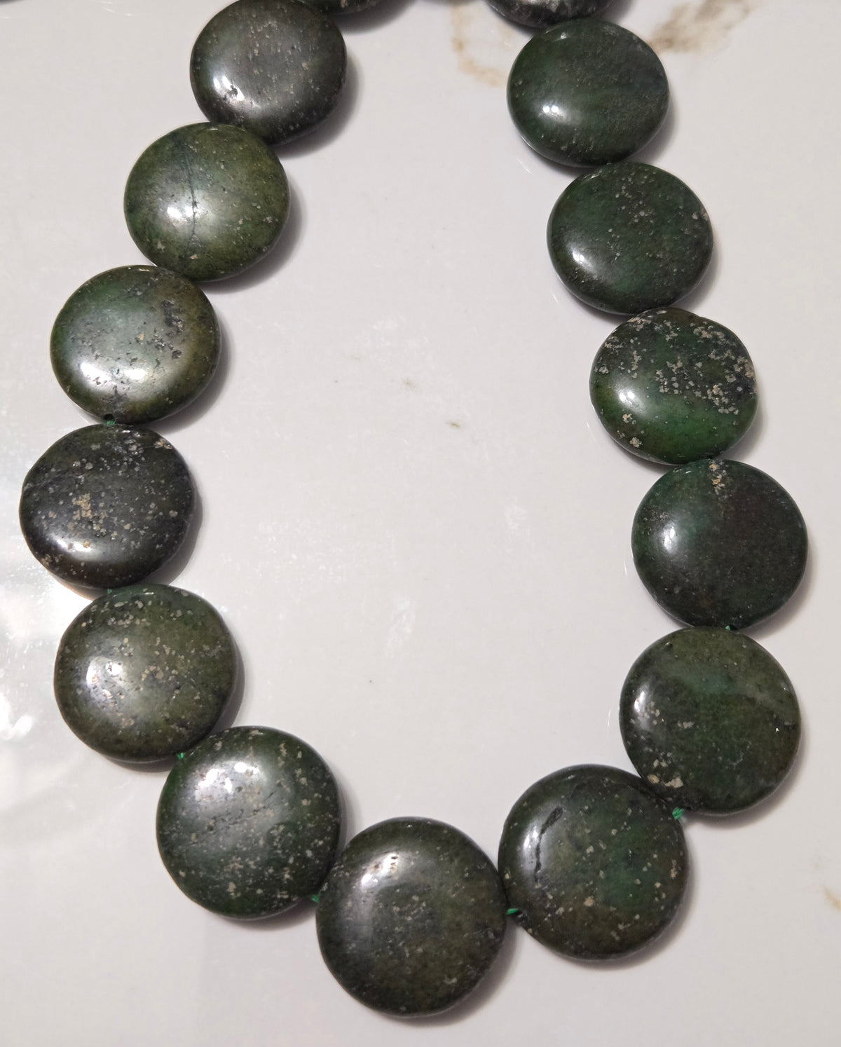 Serpentine gemstone bead bracelet with dark green round beads and subtle speckling