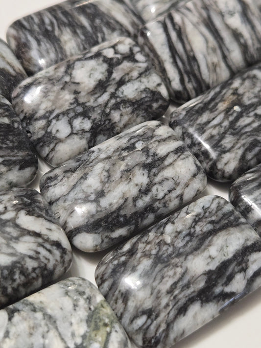 Pinolite rectangle stone pieces, black-and-white marbled, approx. 2x4 cm
