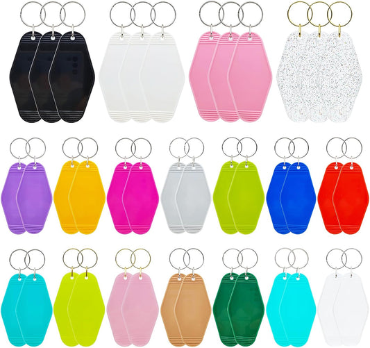 Blank hotel keychain tags with metal rings, assorted colors shown in a grid