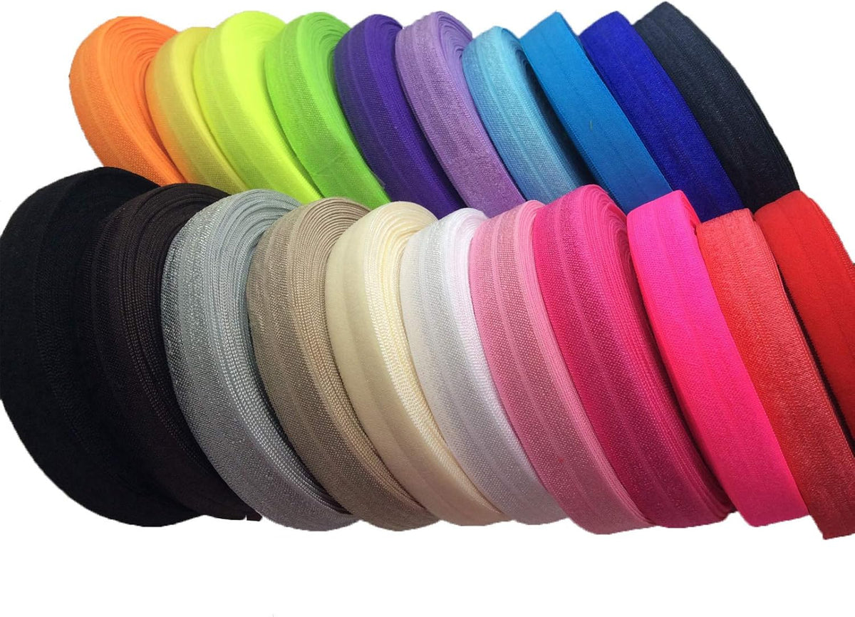 Fold-over elastic tape, assorted colors in stacked spools