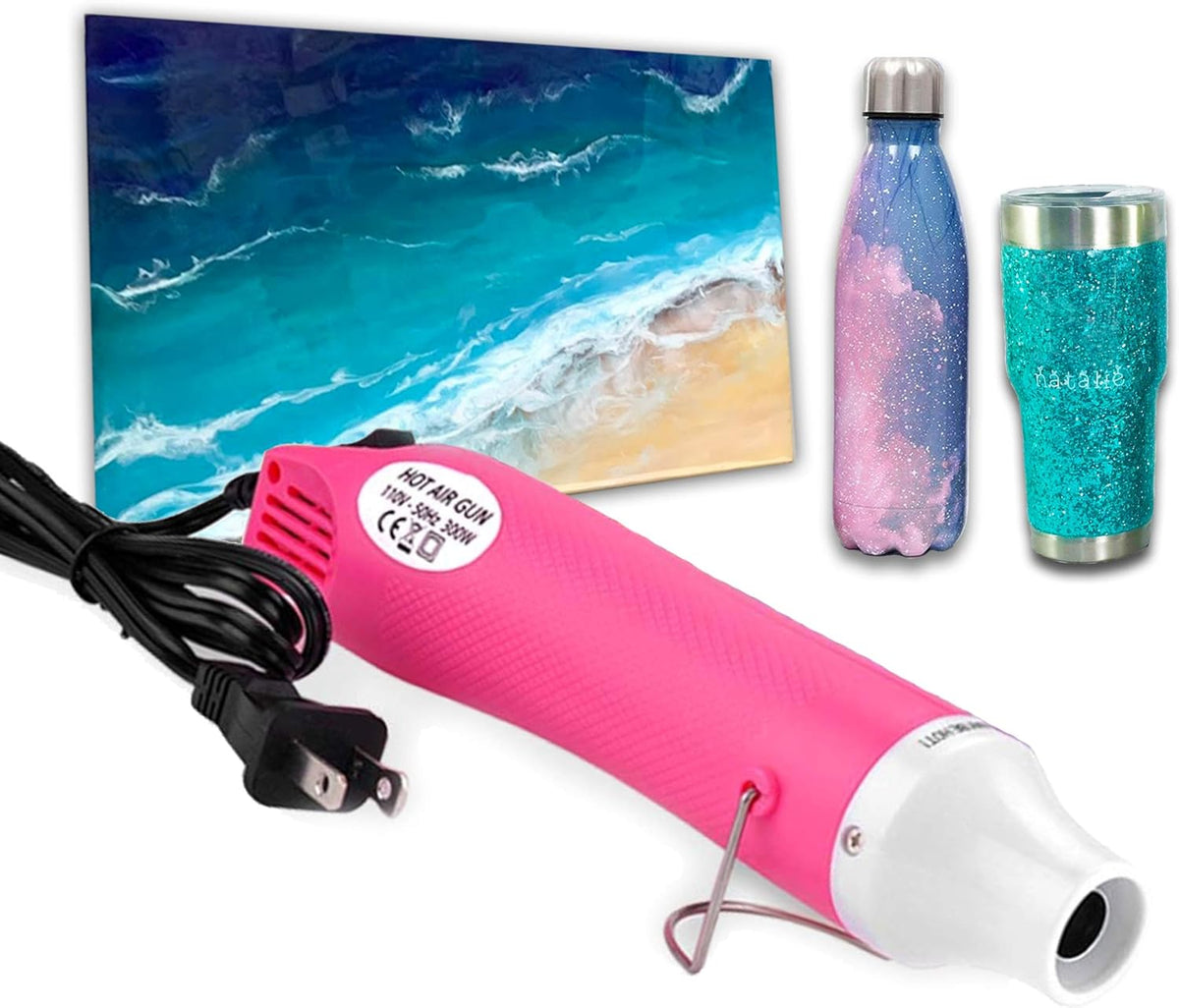 Pink heat gun with nozzle, power cord plug attached