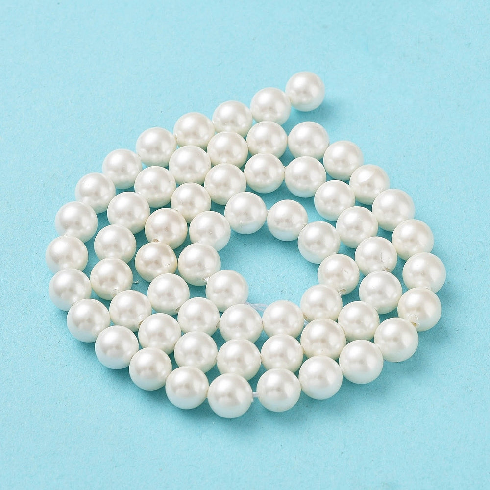 White round shell pearl beads strand, beads in a coiled loop