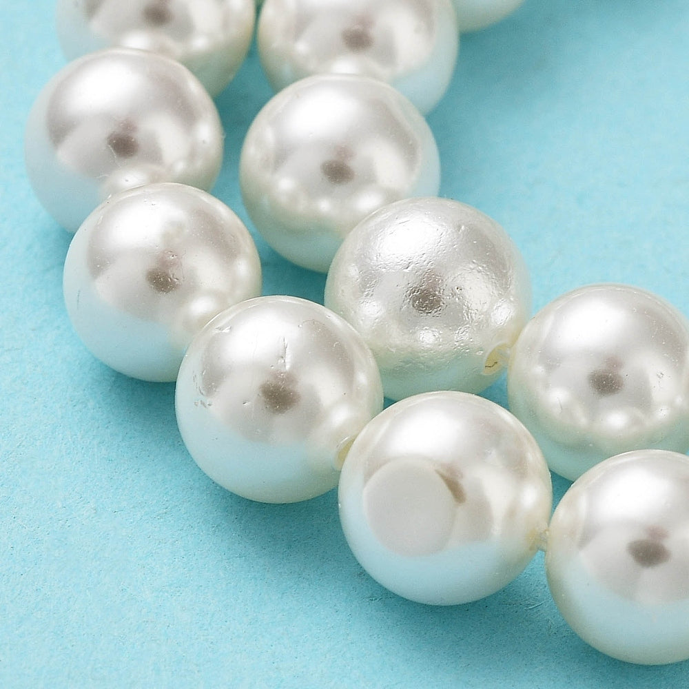 Round white shell pearl beads strand, clustered beads with reflective sheen