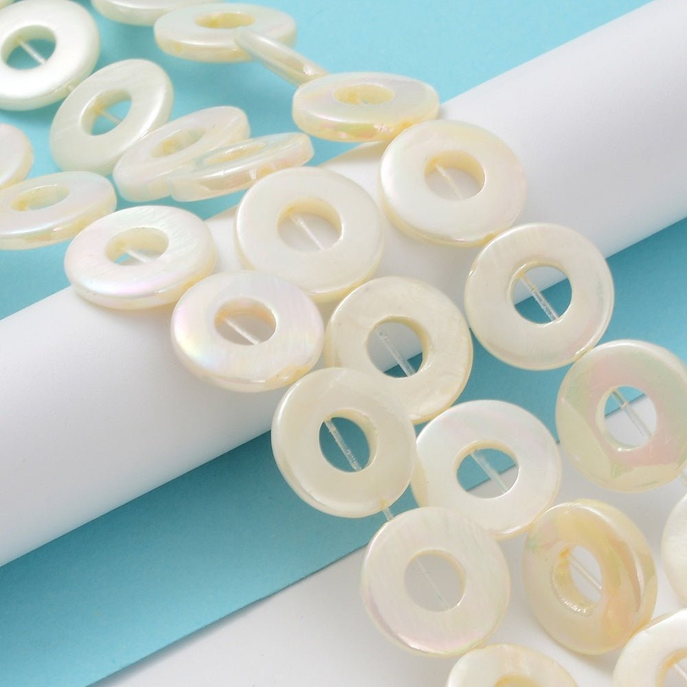 Donut freshwater shell beads, pearl white with iridescent blue-green highlight stripes