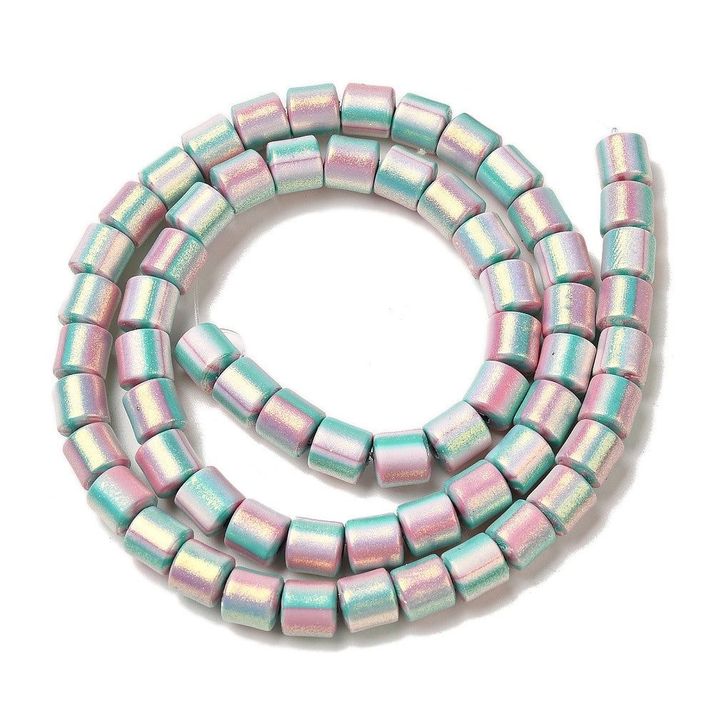 Glitter polymer clay beads strand, coiled circular view with turquoise and pink hues