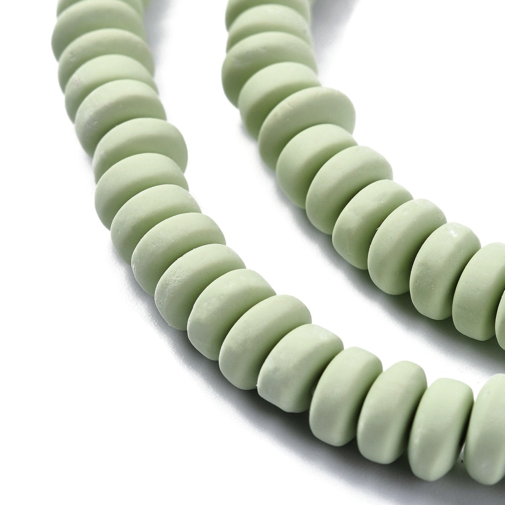 Pale green flat round polymer clay beads strand, smooth ribbed disc beads