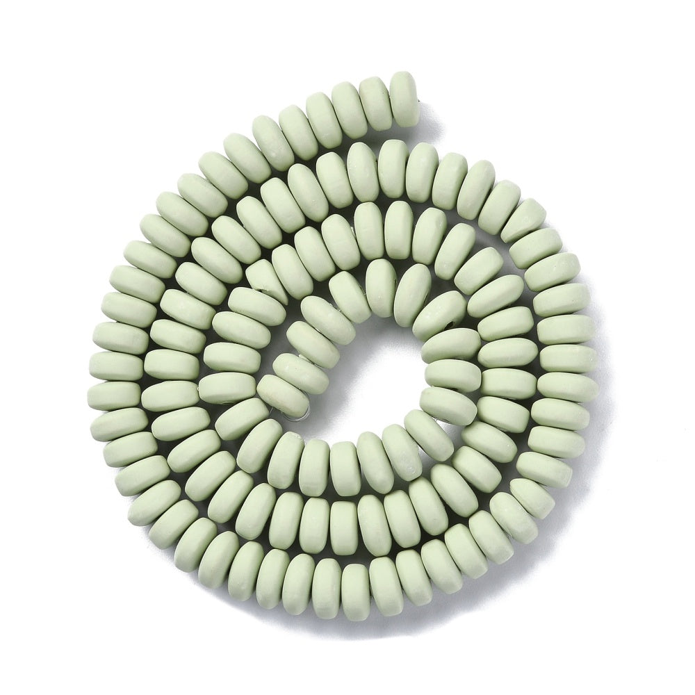 Pale green flat round polymer clay beads strand, coiled circular shape