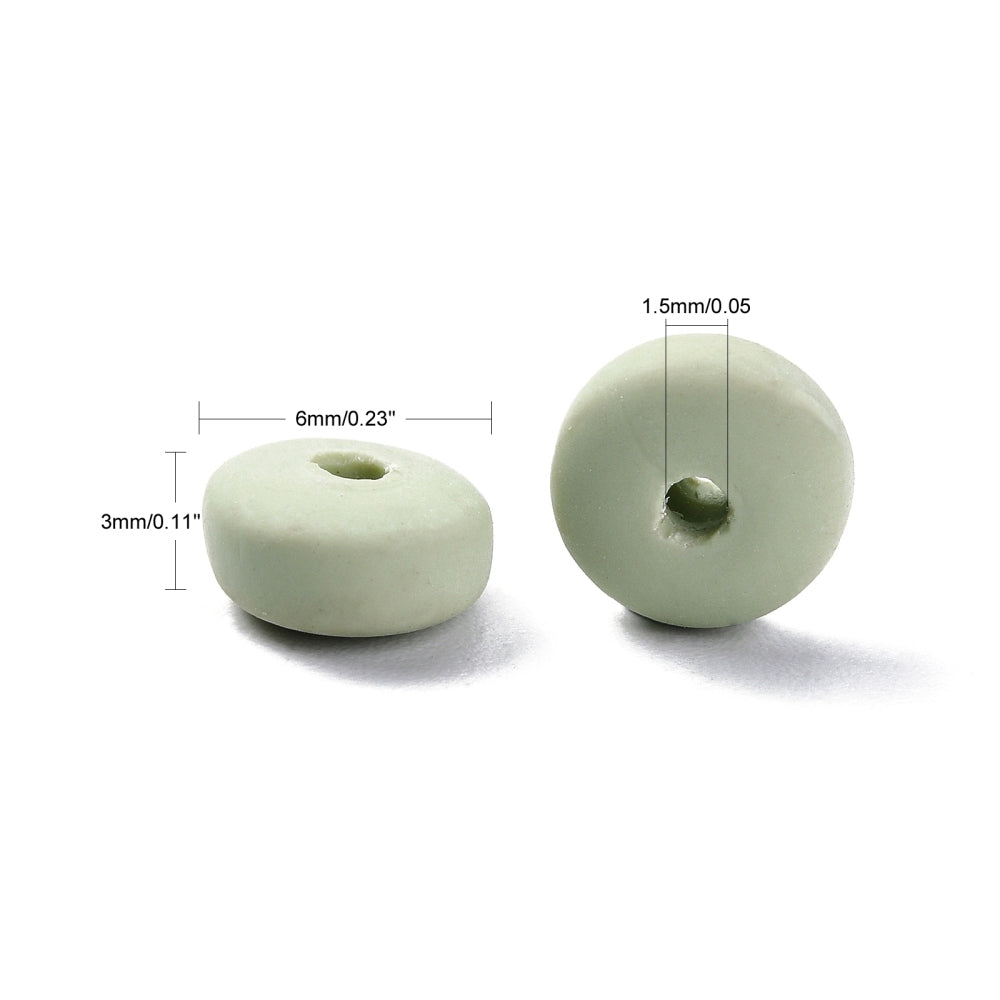 Pale green flat round polymer clay beads with center holes, 6mm x 3mm approx