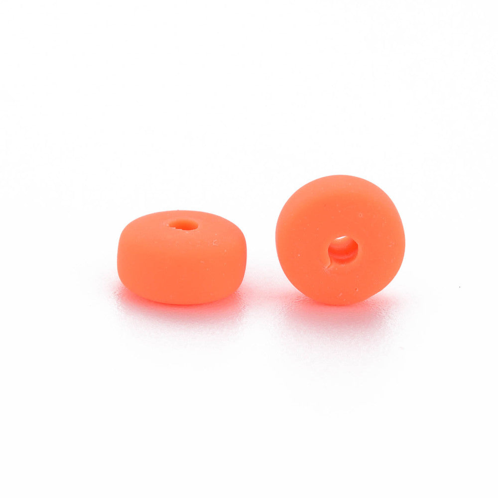Orange-red flat round polymer clay beads, two with center holes