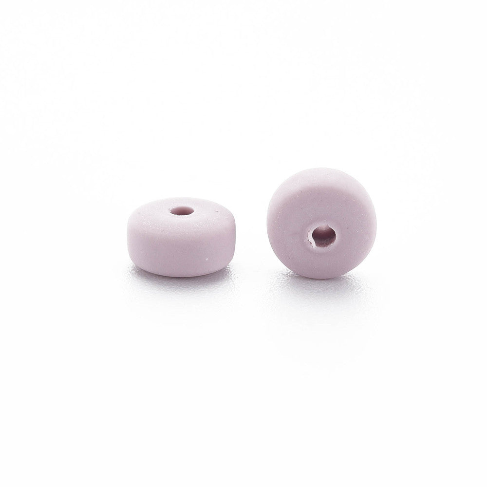 Lavender-pink flat round polymer clay beads with center holes, pair view