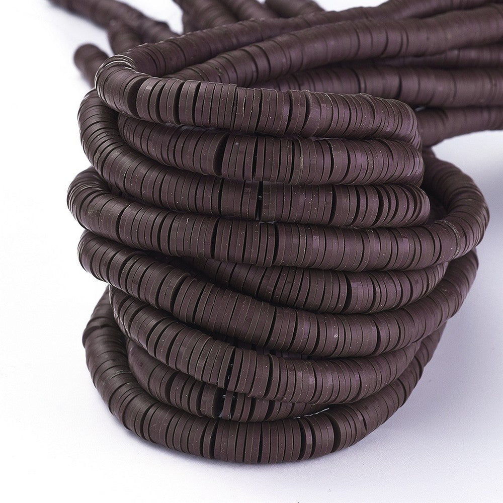 Dark brown flat round polymer clay bead spacers with center hole, on a coiled strand