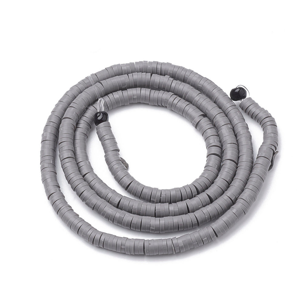 Coiled gray heishi disc bead strands with center holes