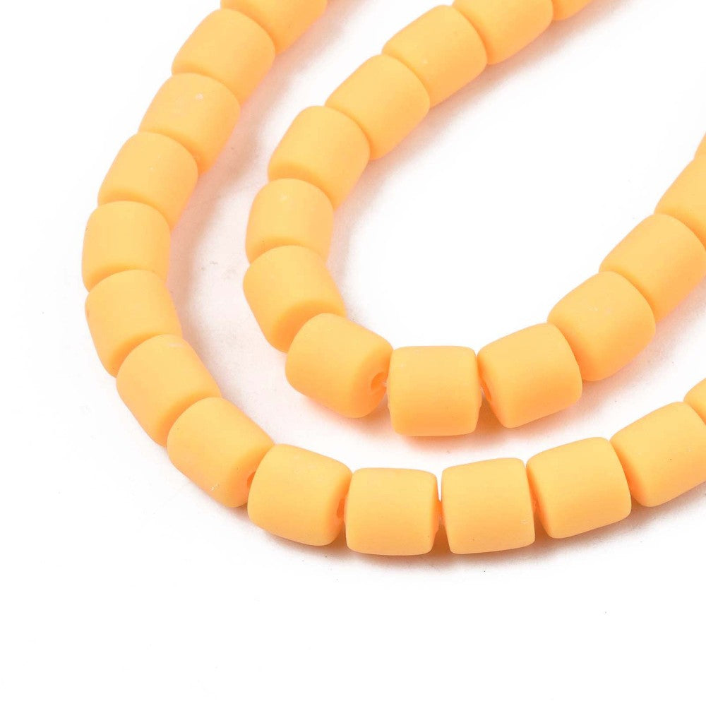 Orange polymer clay bead strand with 6mm tube beads and small end holes