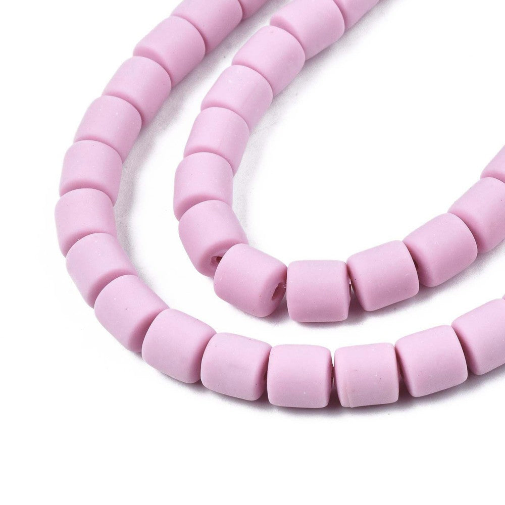 Close view of light purple square-cut column beads with a center hole