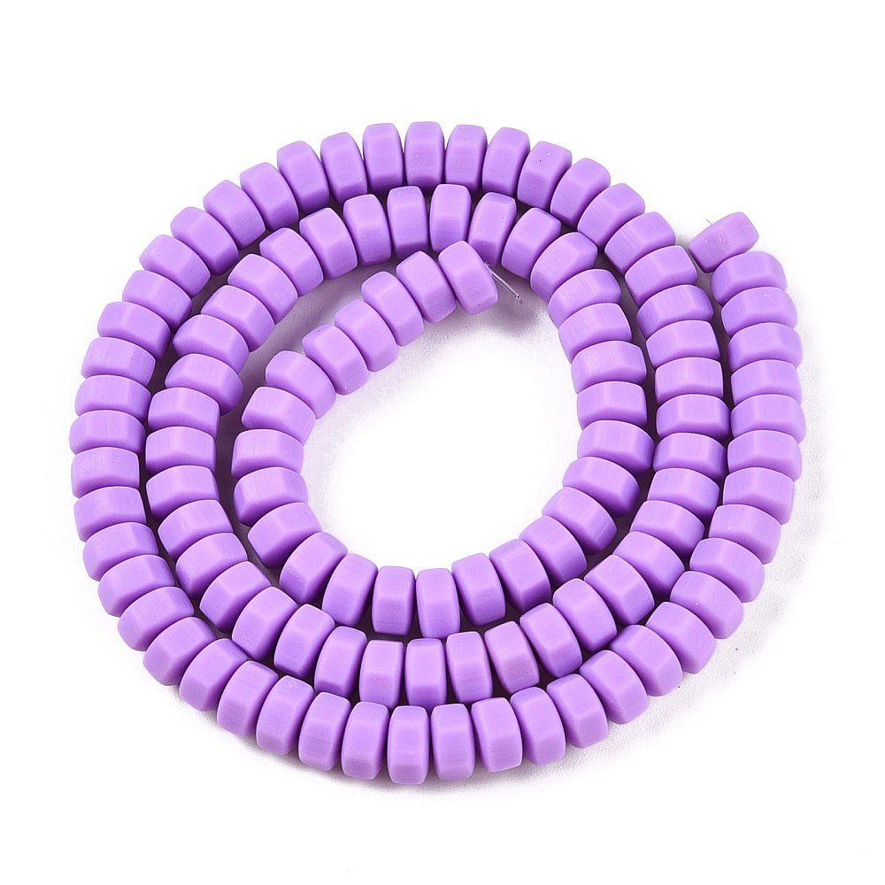 Purple hexagon polymer clay beads strand with circular loop shape, visible central holes