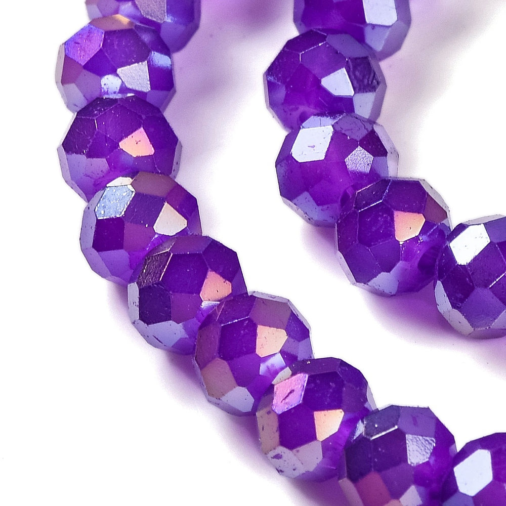 Faceted blue-violet rondelle glass beads with AB iridescent shine, close-up