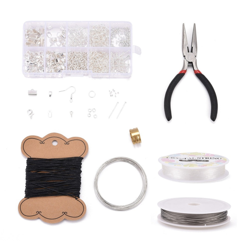 DIY jewelry findings set with silver-tone tools, wire, earring hooks, and crimps