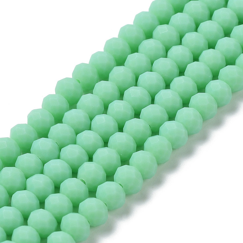 Spring green faceted frosted glass rondelle bead strand, close-up view