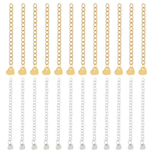 Assorted gold and silver heart tab curb chain extenders with heart end charms in rows