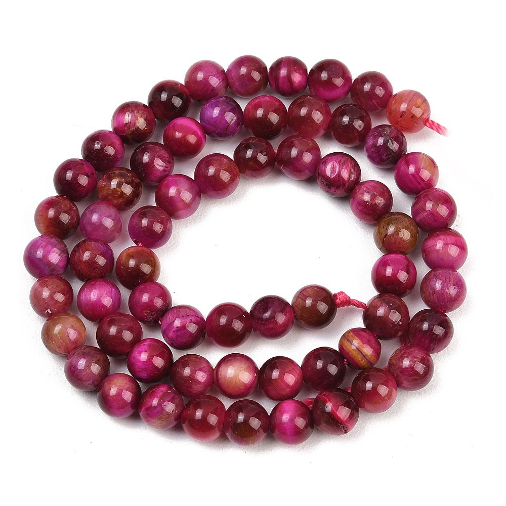 Dyed purple round beads strand with mixed tones, glossy spheres and reflective shine