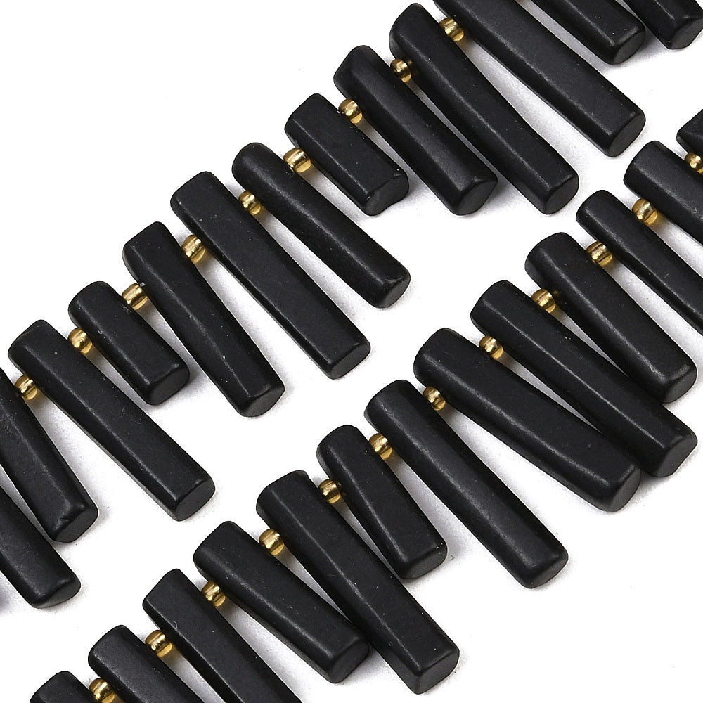Black column shungite beads strand with gold-tone end rings on rectangular beads