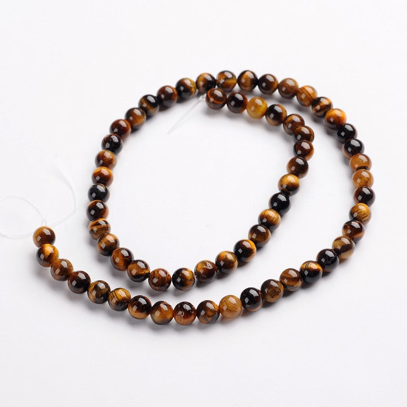 Tiger eye round bead strand with amber and dark brown alternating tones