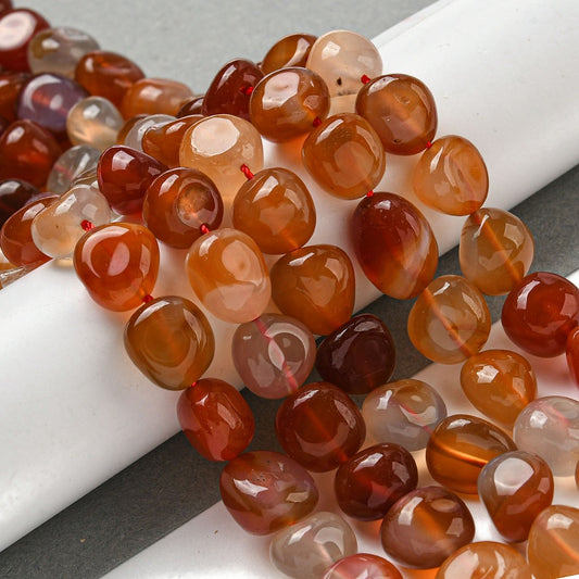 Amber and red agate nugget beads strand with glossy translucent round nuggets