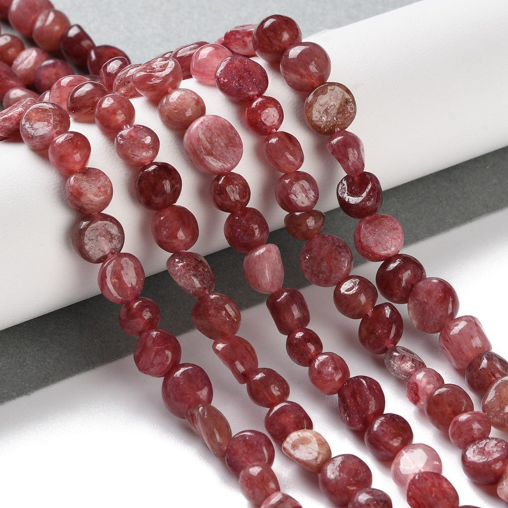 Strawberry quartz bead strand of rounded nugget stones, pink-red speckled finish