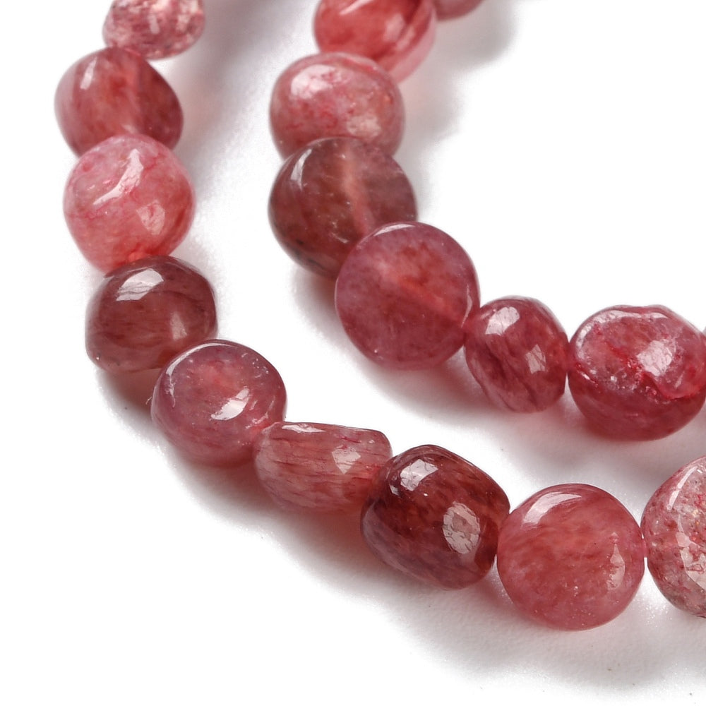 Strawberry quartz tumbled nugget bead strand, pink-red rounded beads with glossy sheen