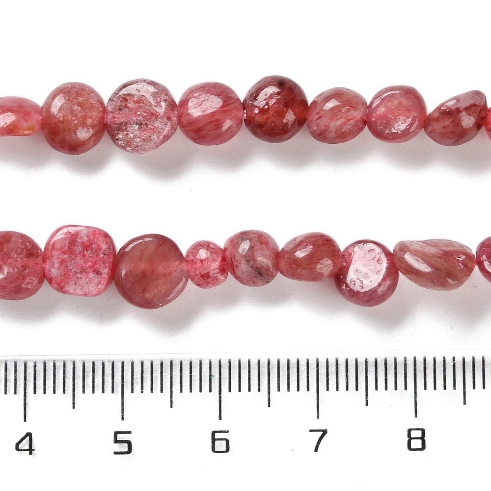 Strawberry quartz nugget bead strand with tumbled pink-red beads and size ruler scale
