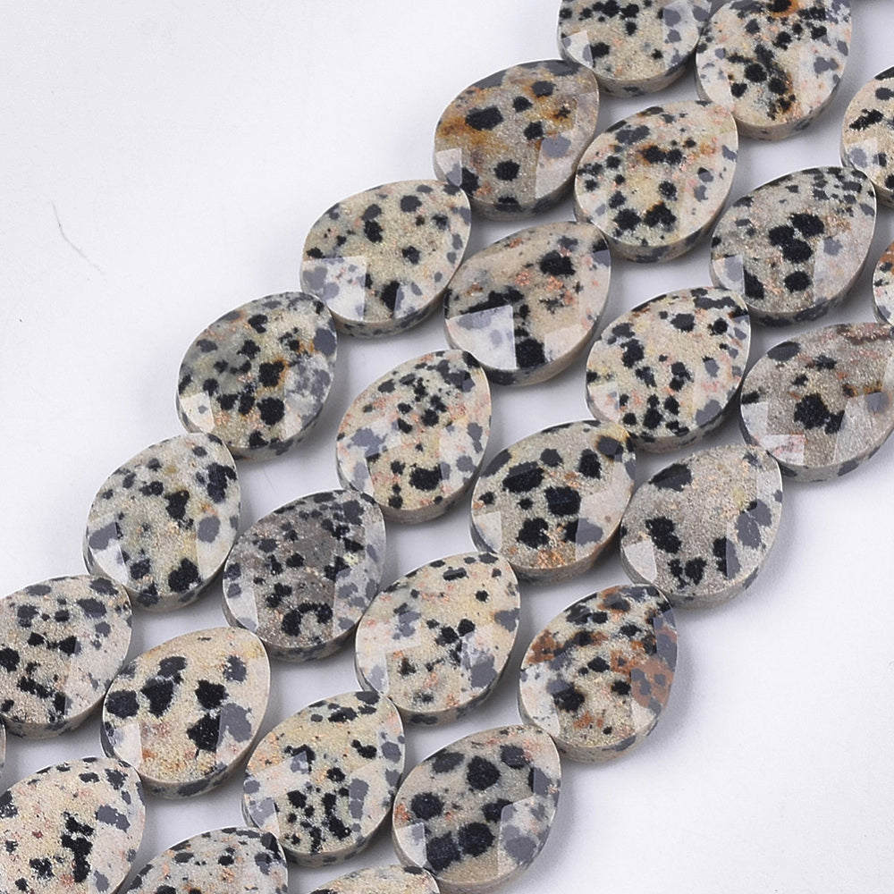 Faceted dalmatian jasper bead strand, spotted teardrop shapes