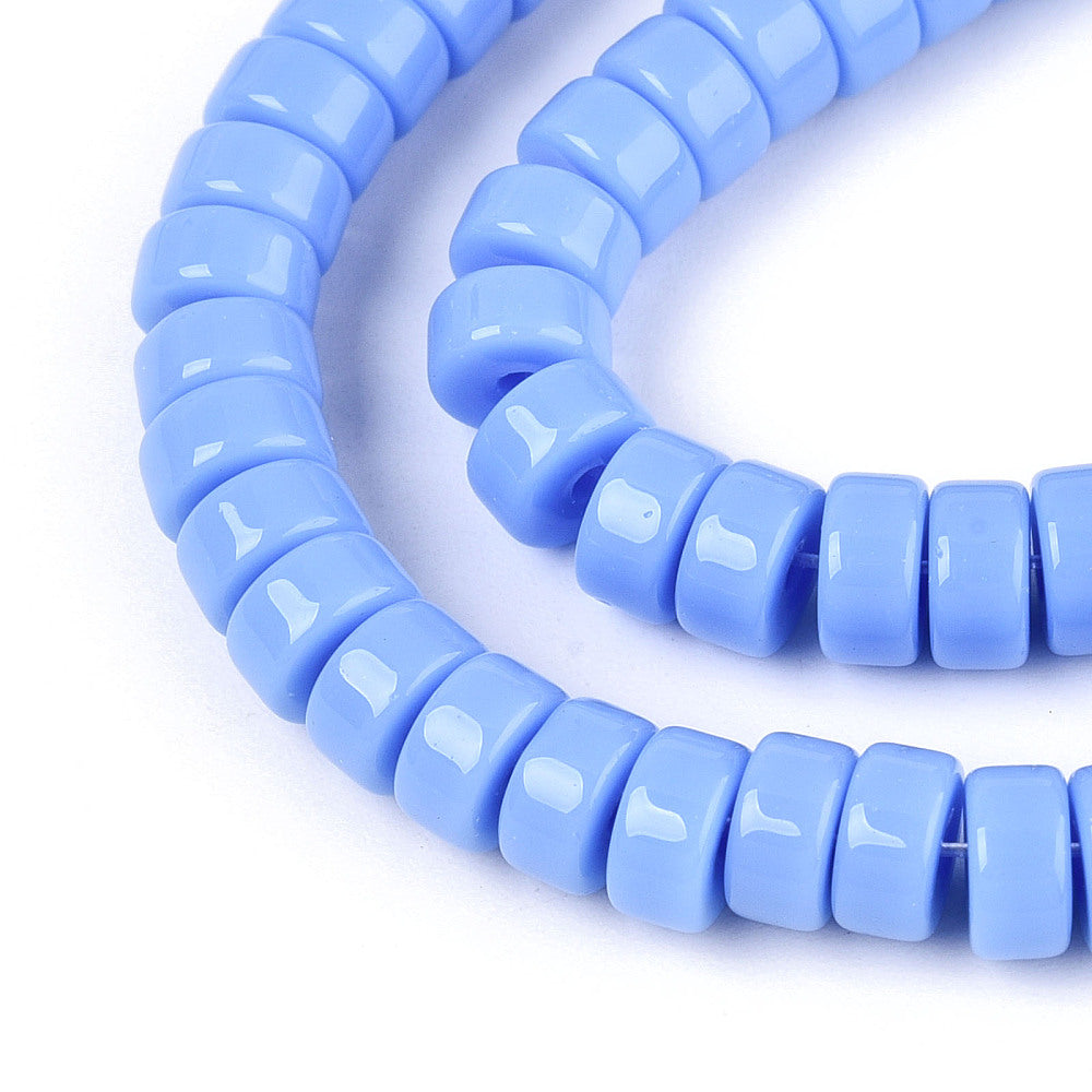 Cornflower blue flat round glass beads strand, side angle close-up