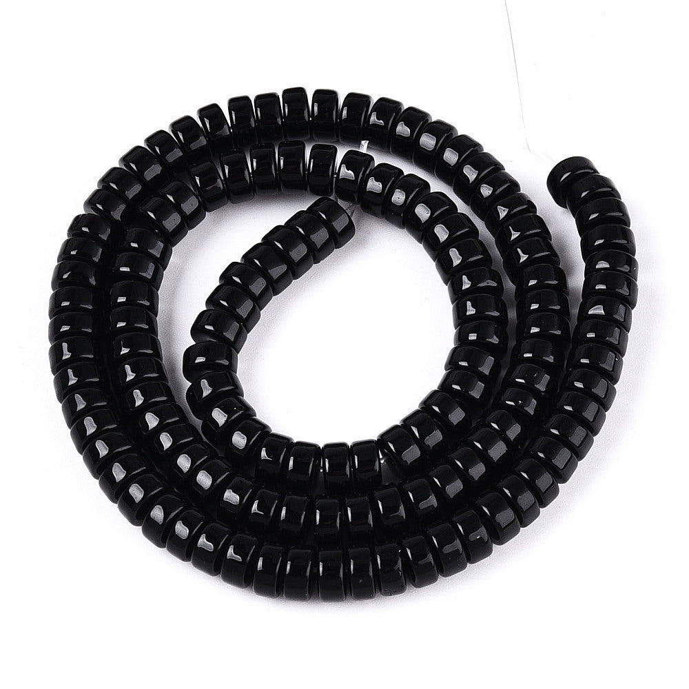 Coiled strand of black opaque glass flat round beads with glossy surface